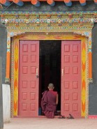 monk on door